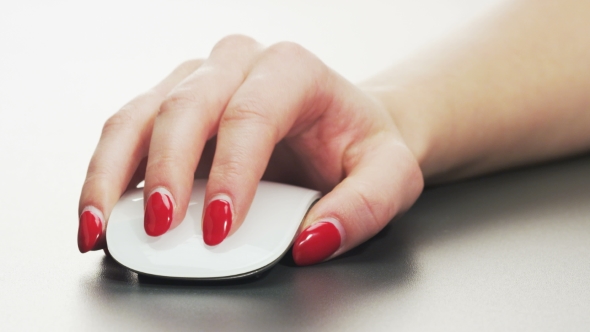 Woman Using Computer Mouse