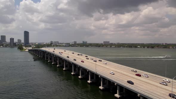 Bridge Over Water Aerial 4k. Drone Flying Past Julia Tuttle Causeway In Miami Fl