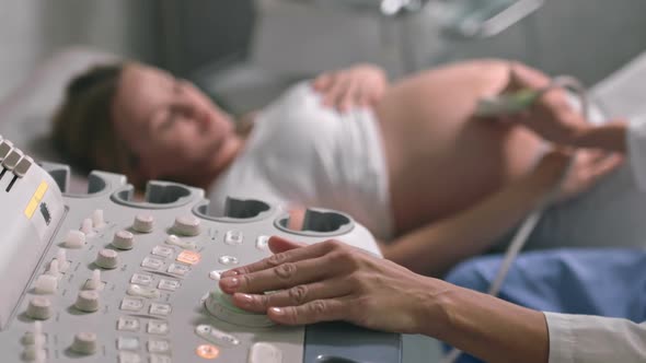 Happy Pregnant Woman on Ultrasound Scanning