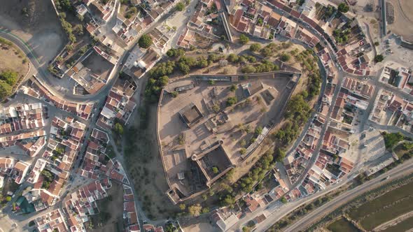 Vertical circular pan aerial shot above Castelo de Castro Marim Castle, Algarve, Portugal.