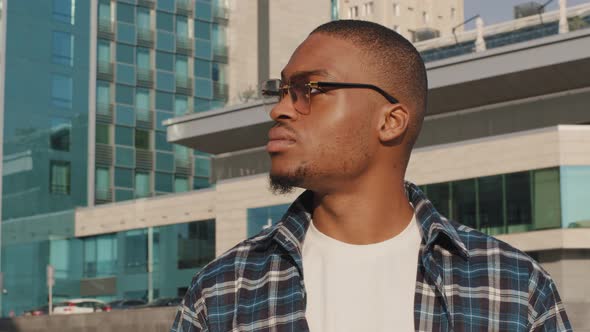 Portrait of Man in City African American Guy Young Student Man in Stylish Sunglasses Wears Plaid