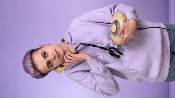 Vertical Shot Young Person Talking By Using Retro Corded Phone Indoors