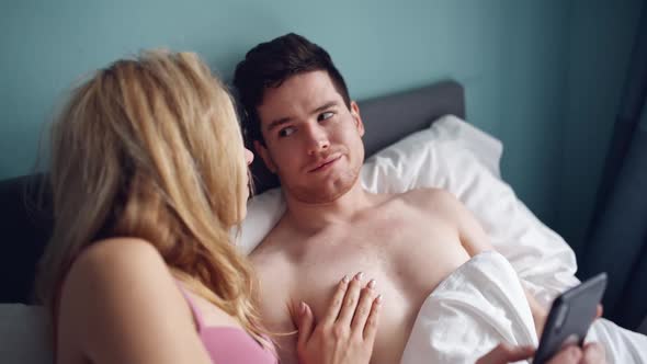 Sad Woman and Man Husband in Bed Lack of Sexual Activity in Family