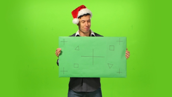 Happy Man in Christmas Hat. Green Screen, Blank Sign