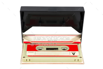Vintage audio tape in the box on white background
