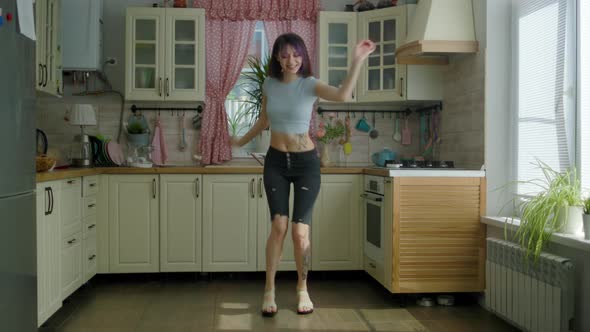 Young Beautiful Woman Dancing Kitchen At Home