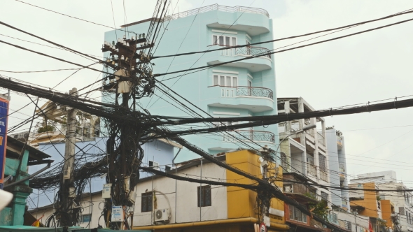 The Web of Power Lines on the Streets of Ho Chi Minh City