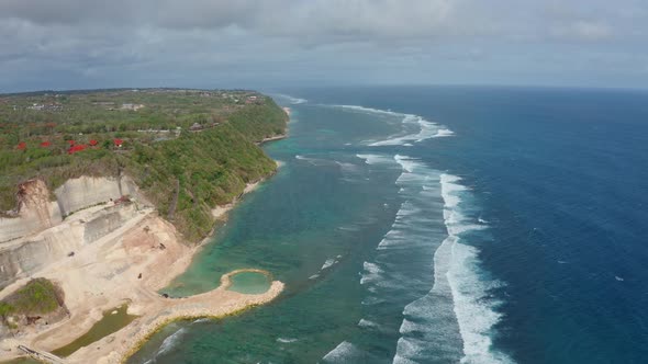 Aerial Footage Tropical Beach and Blue Sea Water with White Waves Drone View