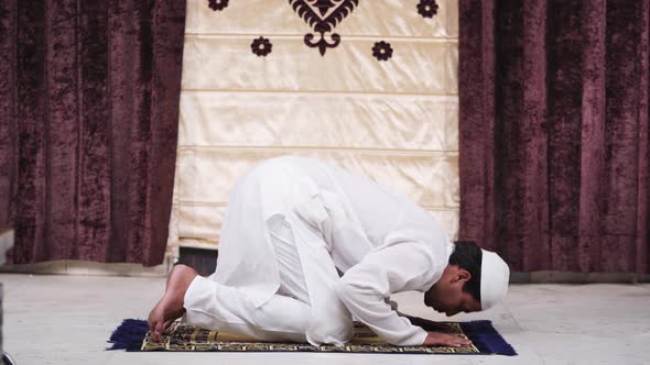 Muslim man performing Namaaz rituals