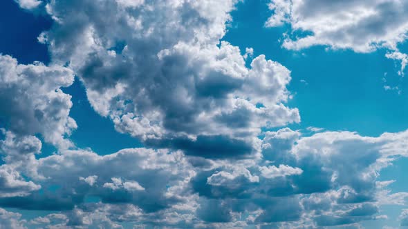 Clouds Moving in the Blue Sky Timelapse Light White Puffy Cloud Space