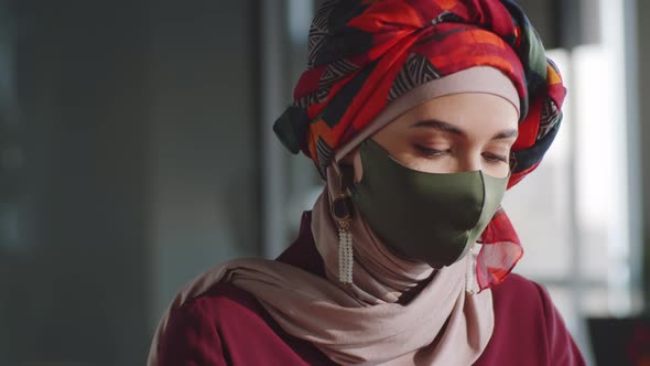 Portrait of Muslim Female Office Worker in Hijab and Mask