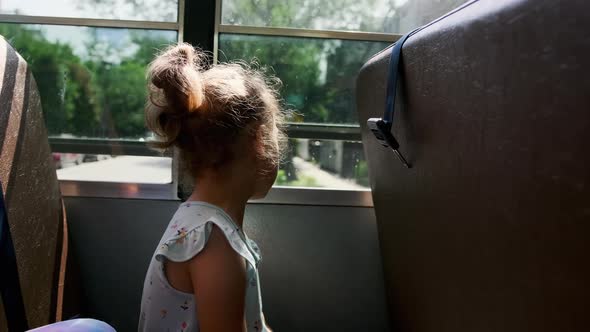 School Girl Riding in Academic Shuttle