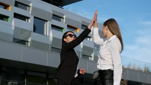 Meeting Of Two Young Businesswomen.