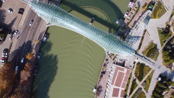 Glass Bridge And Boat In The River