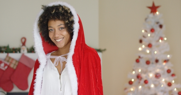 Gorgeous Young Woman Wearing a Santa Outfit