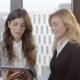 Two Businesswomen with Tablet Computer in Office - VideoHive Item for Sale