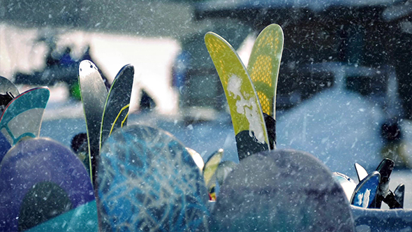 Skis and Boards in Snowfall