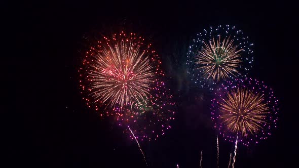 Colorful Firework display at night on sky background