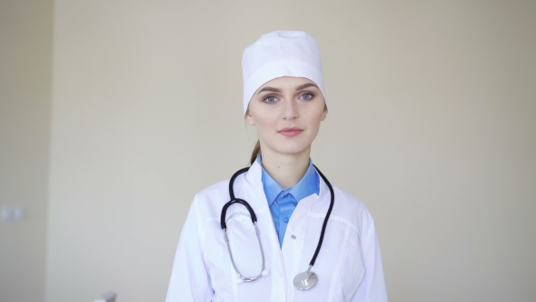 Portrait of a Young Adult Female Doctor, Looking at Camera