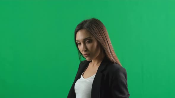 Beautiful Portrait of Business Woman Looking To Camera Green Screen Background