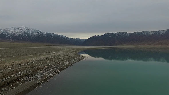 Mountain Lake in Cloudy Weather, Reflection in Water.