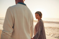 Mature couple walking together on sea shore - PhotoDune Item for Sale