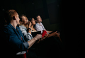 Group of people watching movie in cinema - PhotoDune Item for Sale