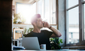 Businessman sitting at his office talking on cell phone - PhotoDune Item for Sale