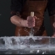 Barman with Strong Arms Crushing Ice with Special Fork and Breaking Off a Big Piece of Ice - VideoHive Item for Sale