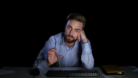 Man Waiting with Indifference To Download the File. Dark Studio