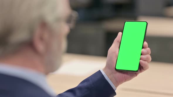 Male Doctor Using Smartphone with Chroma Screen