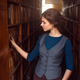 Young woman selecting book from library shelf. - photodune.net Item for Sale