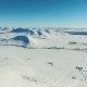Aerial Shot of Mountains and Fields By Ski Resort - VideoHive Item for Sale