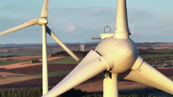 Wind Farm Turbines at Sunset Generating Renewable Power