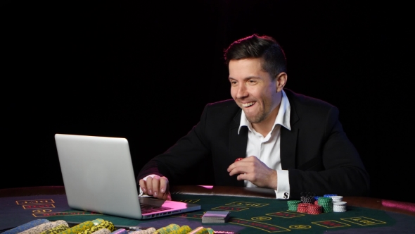 Man Playing Poker Online and Loses