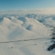Winter in the Mountains. Flying Over the Road in Winter. - VideoHive Item for Sale