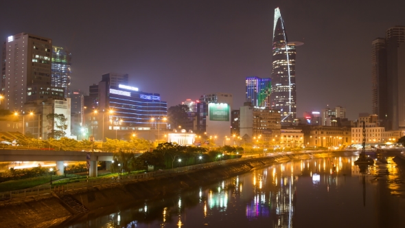 Cityscape of Ho Chi Minh at Night with Bright Illumination of Modern Architecture, Viewed Over