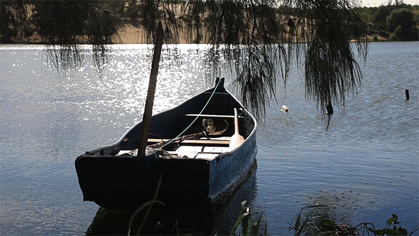 Anchored Boat on Tthe Lake