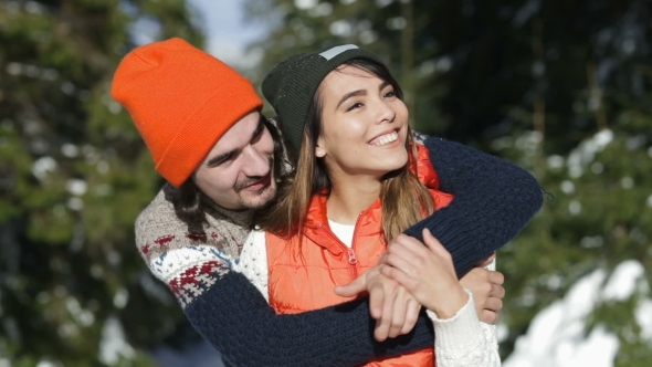 Romantic Couple Snow Forest Young Man And Woman Outdoor Winter Pine Woods