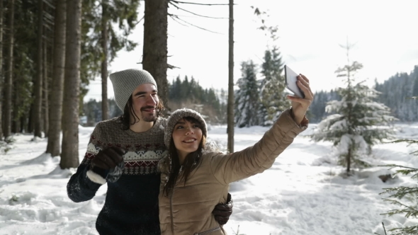 Couple Winter Snow Forest Walk Man And Woman Taking Selfie Photo Smart Phone Happy Smile