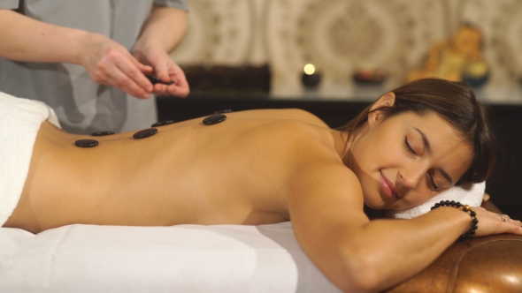 Girl on a Stone Therapy, Hot Stone Massage