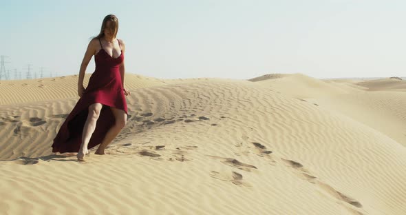 Posing and Slow Dancing on Top of a Sand Dune in the Middle of the Desert