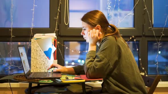 Woman Working on Laptop Computer and Surfing the Internet