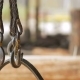 Hook of Overhead Winch Crane . Builder Sawing Wood Using a Chainsaw in the Background. Moving the - VideoHive Item for Sale