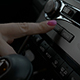 Woman Typing Radio Button in Car - VideoHive Item for Sale