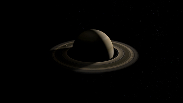 Moon Orbiting on Rings of Planet Saturn