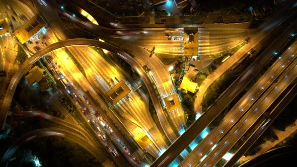 Aerial view shot of fast moving above interchange and motorway road