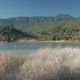 Dry Grass By the Suluklu Lake with Green Hills and Ancient Wall on the Background, Dalyan, Turkey. . - VideoHive Item for Sale