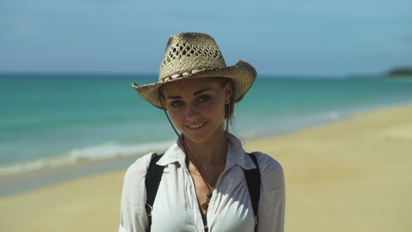Portrait Of Smiling Female By The Sea