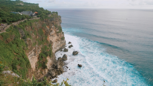 Scenic View of High Cliff and Deep Blue Sea at the Foot of the Rock. Breathtaking Panoramic Scene of